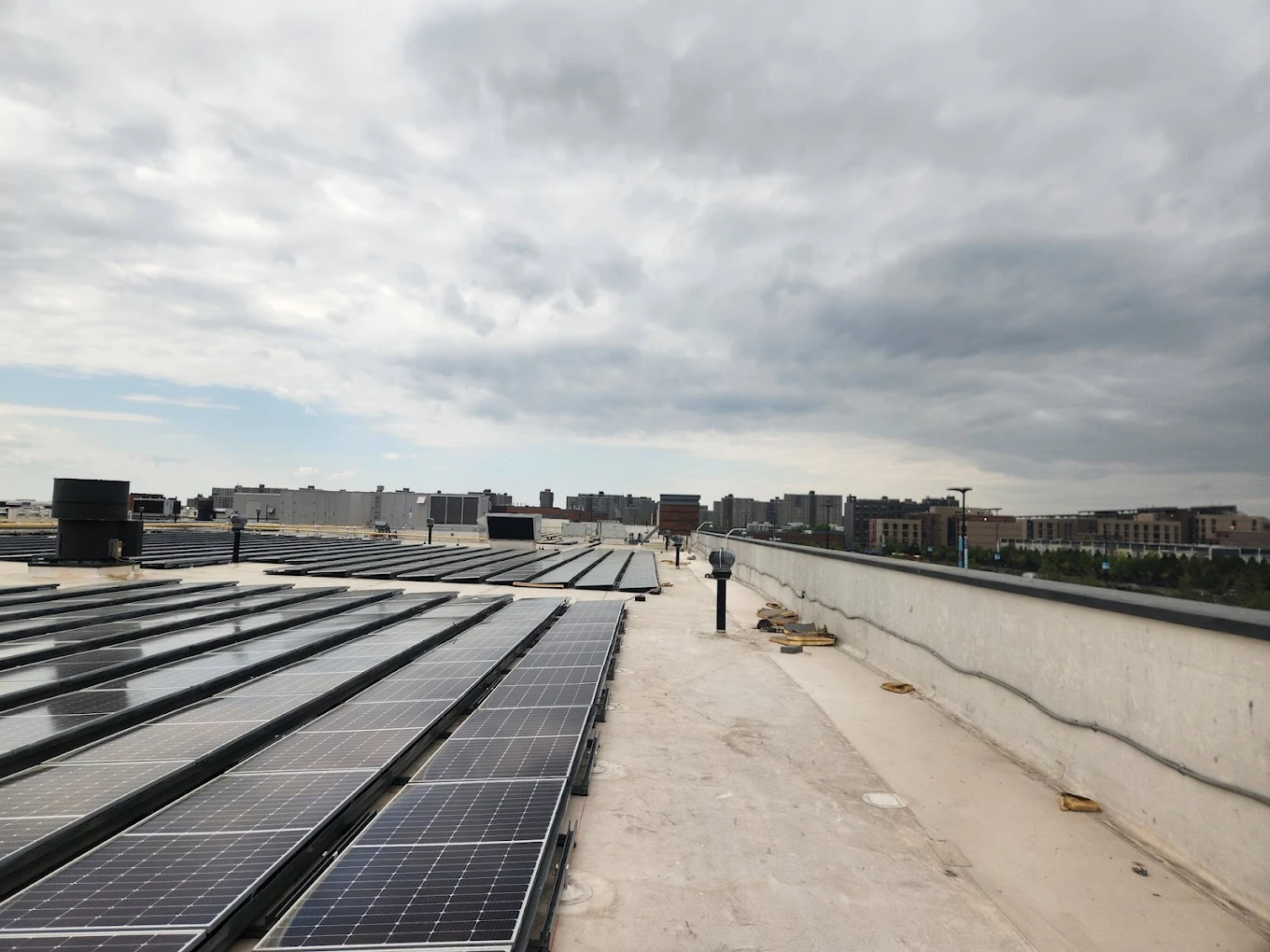 Completed commercial flat roof project by All-Star Roofing Inc. in West Islip, NY — pristine EPDM membrane on a multi-tenant commercial building